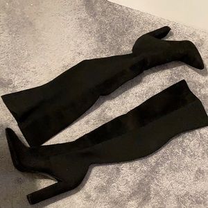 Steve Madden beautiful black over the knee boots.